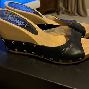 Guess black and stud wedges.
